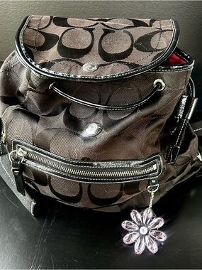 Coach Black and Brown Signature Canvas Backpack with Flower Charm